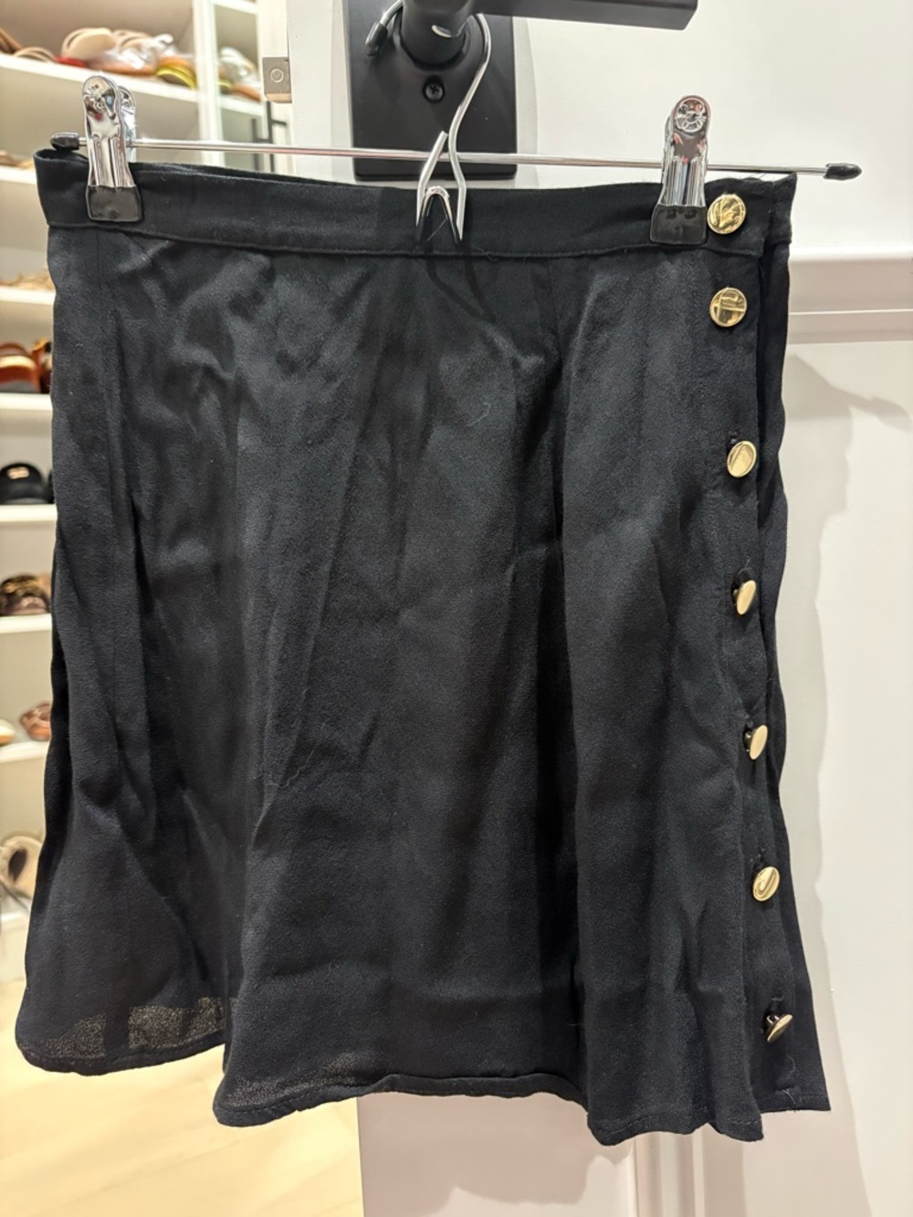 Women’s Reformation black skirt with gold buttons size 2